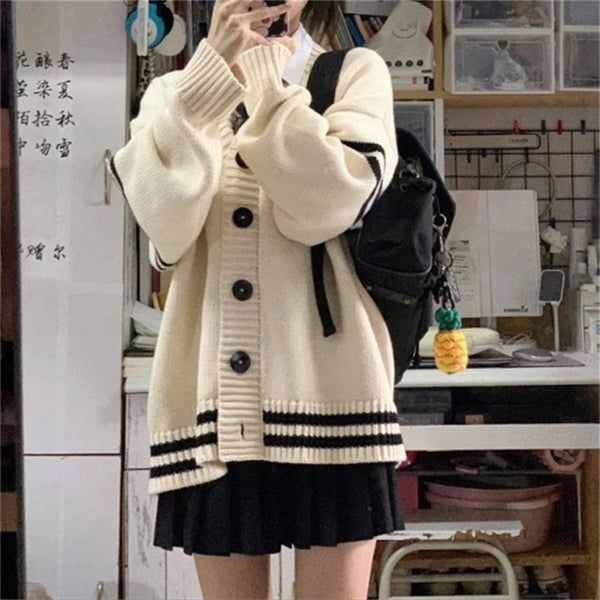 Front view of the beige Buttoned Varsity Sweater 