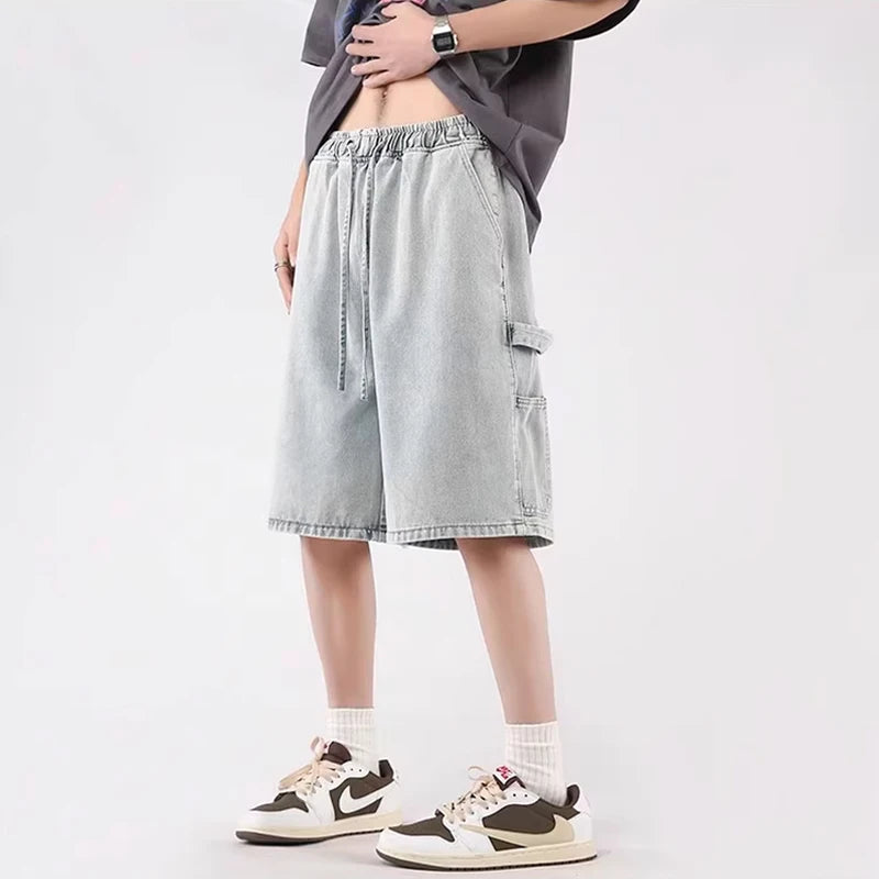 A model wearing the light blue Baggy High Blue Denim Jorts from DAXUEN