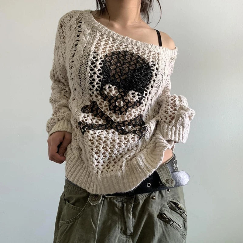 Model wearing the beige Skull Graphic Distressed Knit Sweater