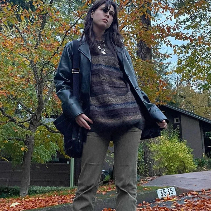 Model wearing the gray Striped Oversized Knit Sweater