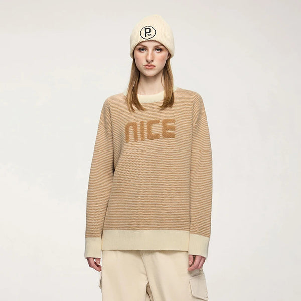 Model wearing the khaki NICE Slogan Sweater