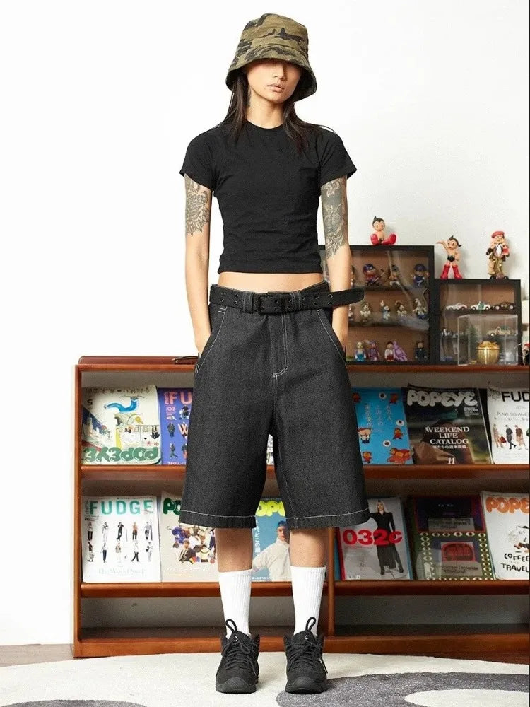 Model wearing the black Oversized Cargo Jorts