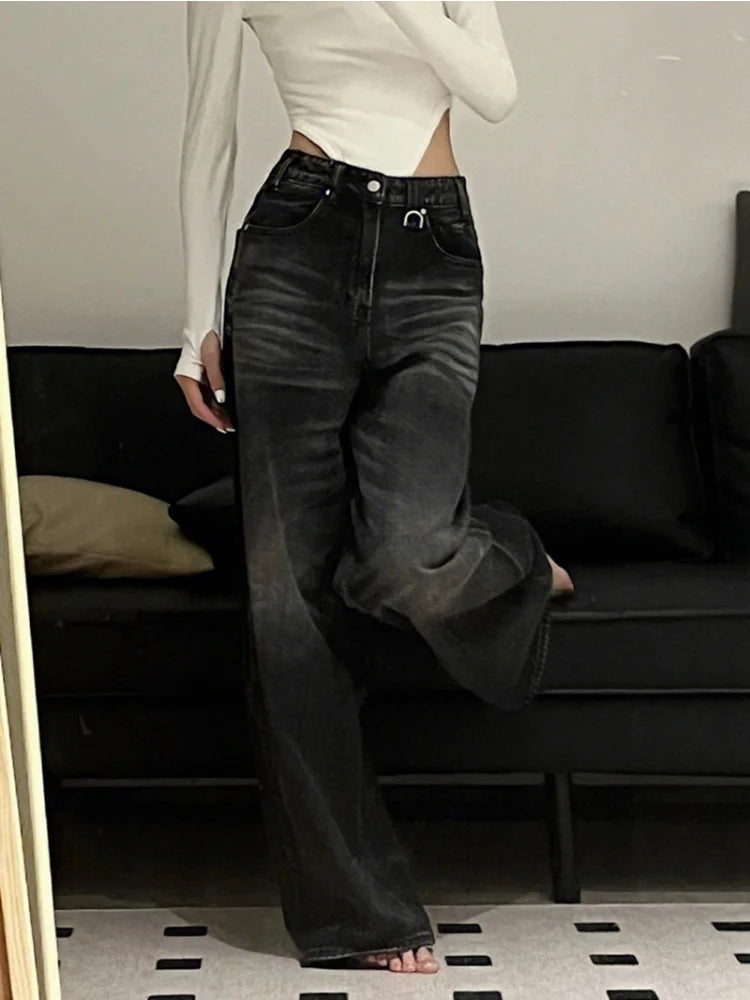 Model wearing the black Distressed Wide-Leg Jeans