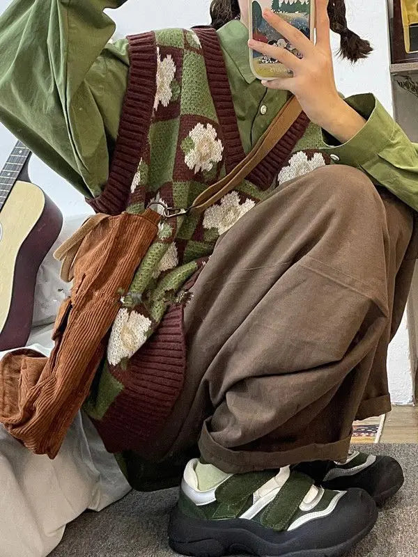 Model wearing the green Retro Flower Grid Sweater Vest