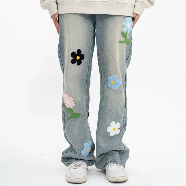 Model wearing the blue Retro Flower Embroidered Jeans 