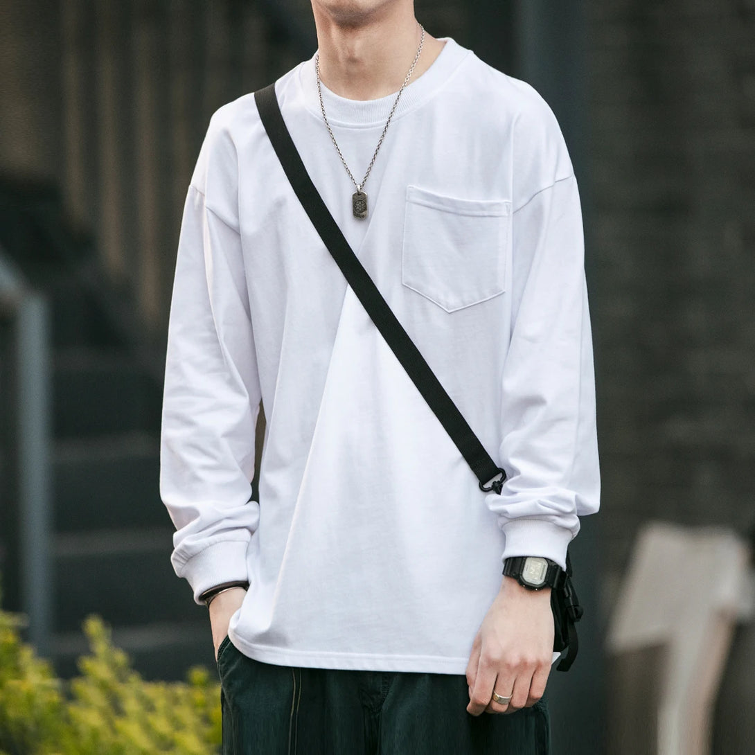 Model wearing the white Versatile Basic Long Sleeve T-shirt