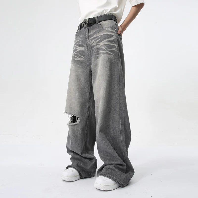 Model wearing the gray Vintage Distressed Baggy Jeans