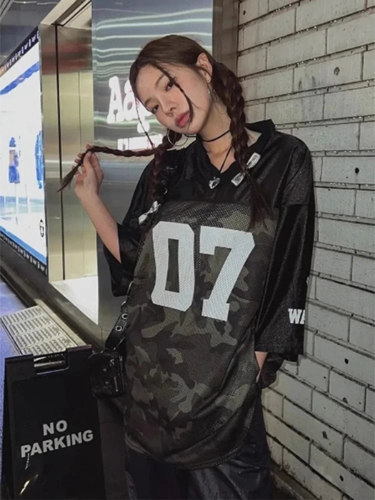 Model wearing the black Women's Urban Camo Sports T-shirt