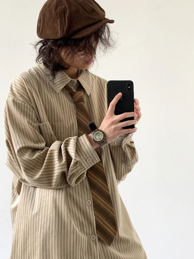 Model wearing the khaki Classic Striped Button-Up Shirt