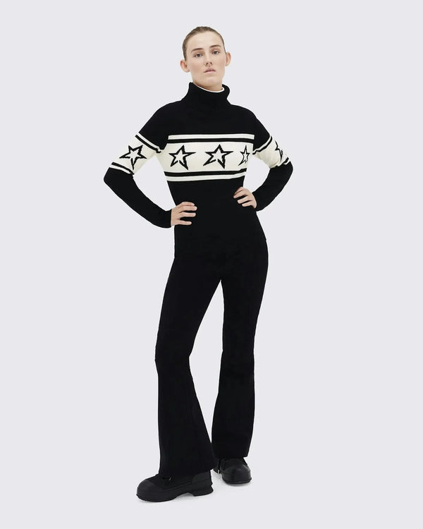 Model wearing the black Star Pattern Turtleneck Sweater