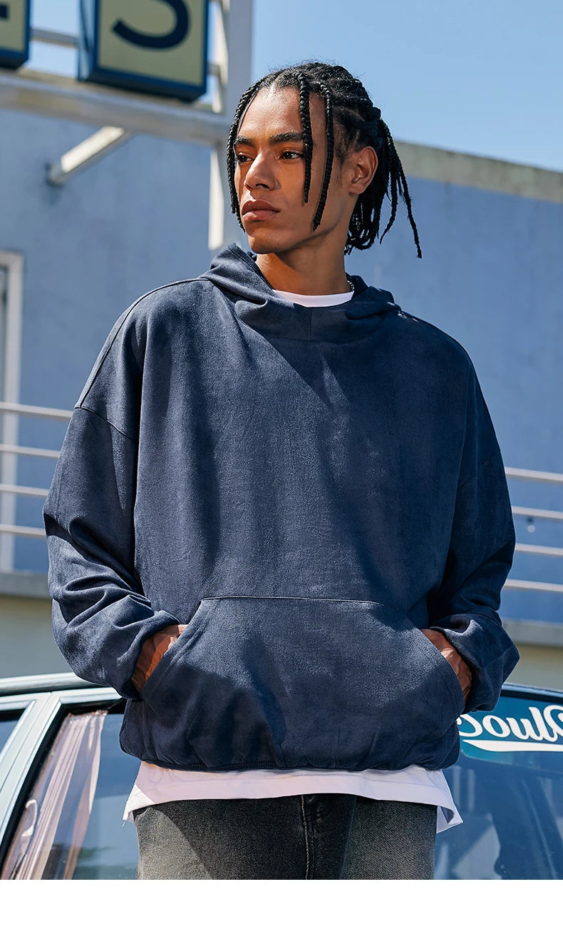 Model wearing the blue Ocean Breeze Hoodie 