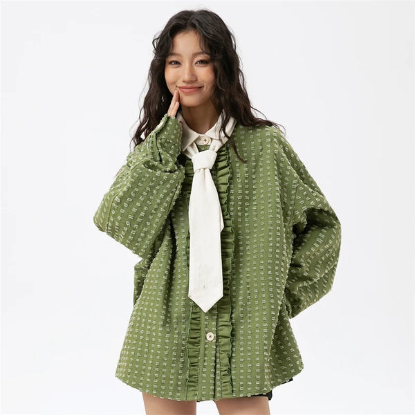 A girl wearing the green Women's Spring Hippie Shirt from DAXUEN