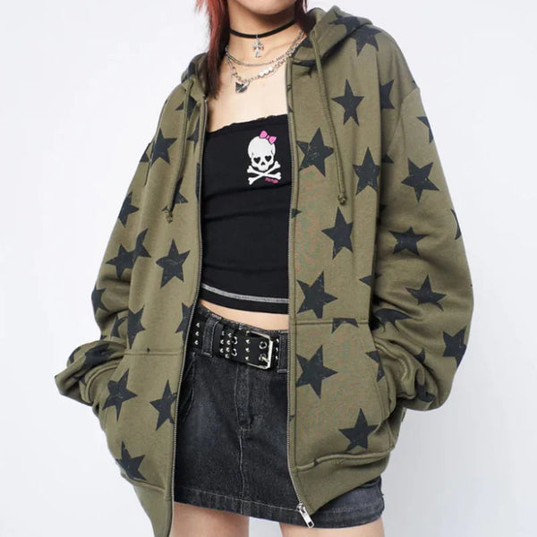 Model wearing the olive green Star-Print Oversized Sweatshirt in a gray background