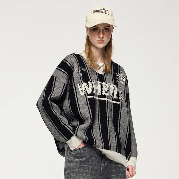 Model wearing the black Striped Wheel With Star Design Sweater 