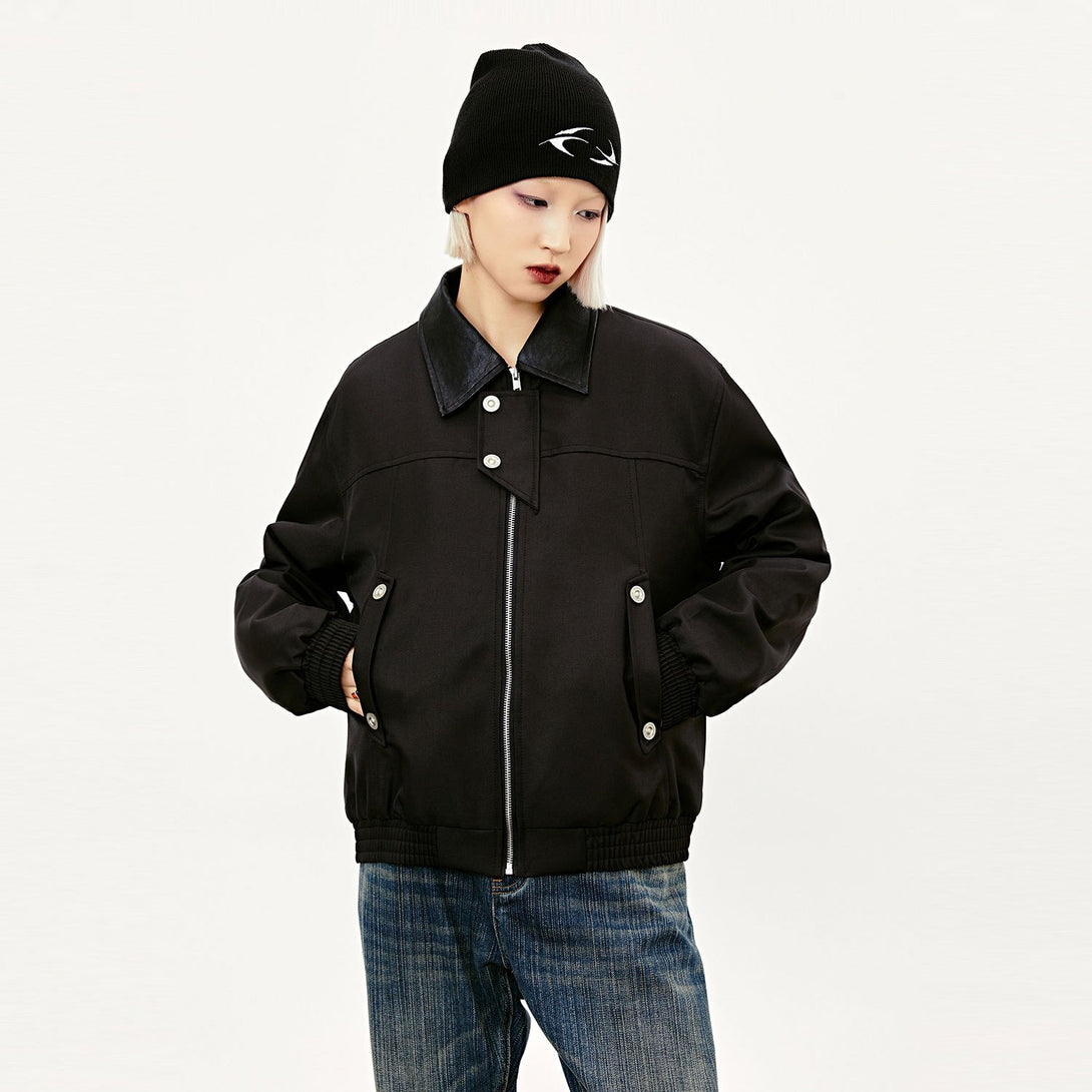 Model wearing the black Solid Color Classic Padded Jacket in a gray background 