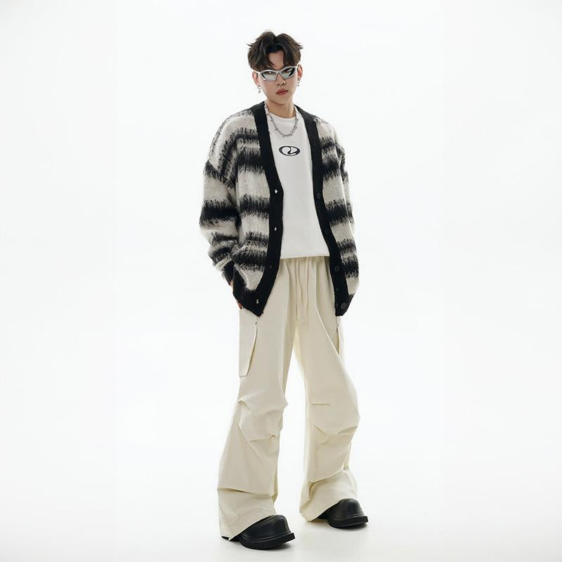 A model posing while wearing the Loose Solid Color High Waist Cargo Pants