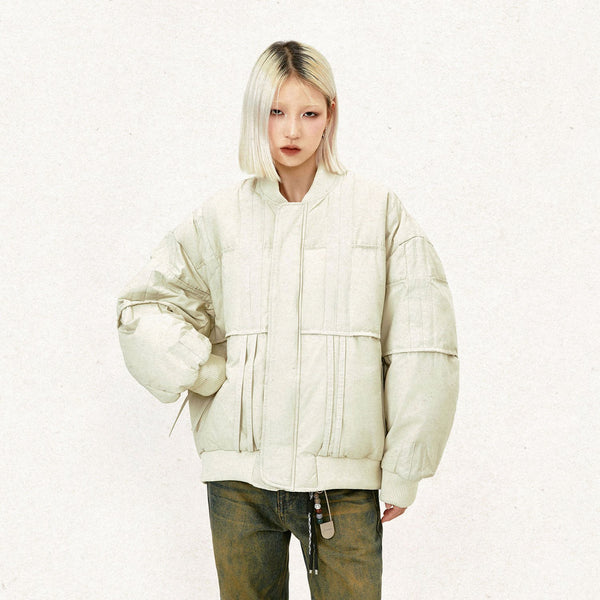 Model wearing the beige Oversized Loose Flying Jacket in a gray background 